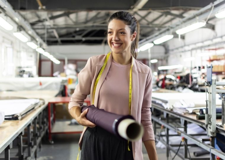 Smiling worker in factory