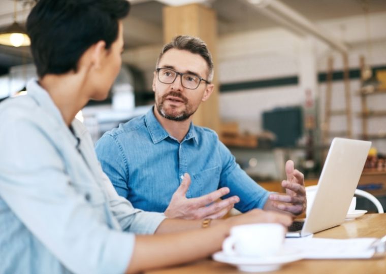 Two workers in meeting