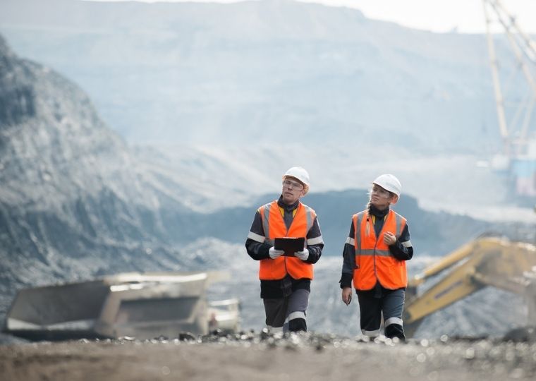 Two workers at a mine